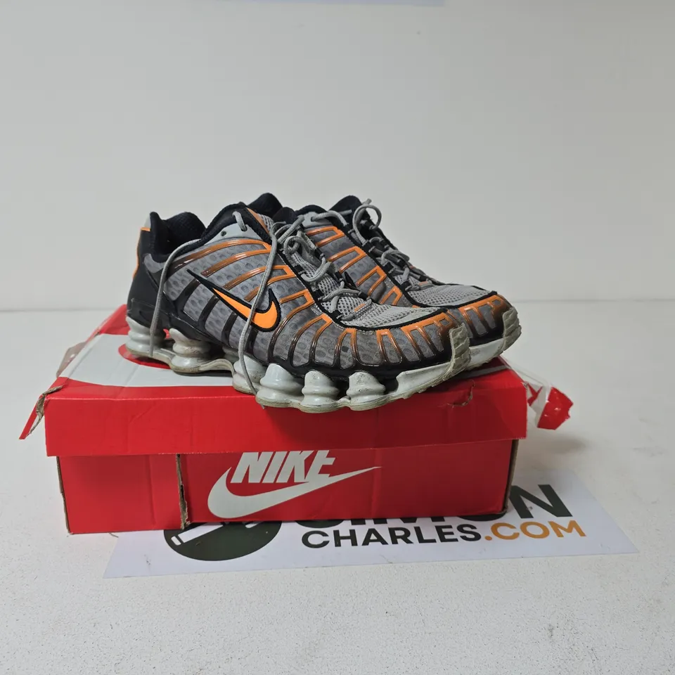 CAGE OF APPROXIMATELY 5 ASSORTED ITEMS TO INCLUDE NIKE SIZE 10 TRAINERS BOXED ETC