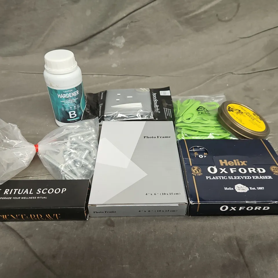 TOTE OF APPROXIMATELY 10 ASSORTED HOUSEHOLD ITEMS TO INCLUDE ERASER'S, PHOTO FRAMES AND EPOXY RESIN