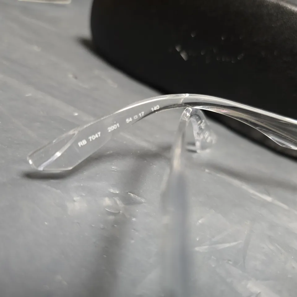 RAY-BAN RB7047 CLEAR PLASTIC EYEGLASSES