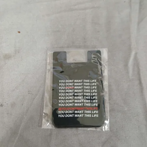LARGE QUANTITY OF 3M ADHESIVE CARD HOLDERS FOR YOUR MOBILE PHONE WITH THE LOGO YOU DONT WANT THIS LIFE ON THE FRONT .