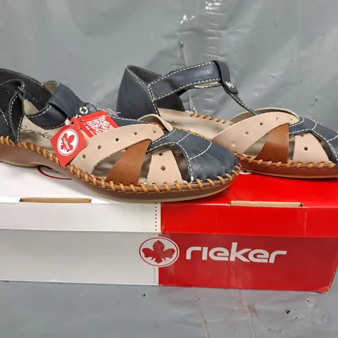 BOXED PAIR OF RIEKER OPENED HANDSEWN SHOES IN BLUE SIZE 5