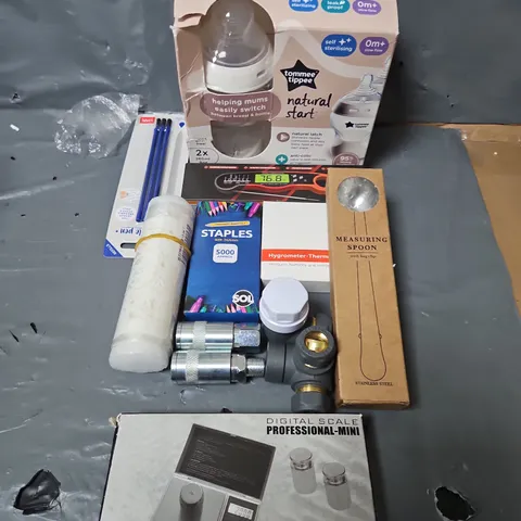 BOX OF ASSORTED HOUSEHOLD ITEMS TO INCLUDE TOMMEE TIPPEE, STAPLES AND MEASURING SPOON