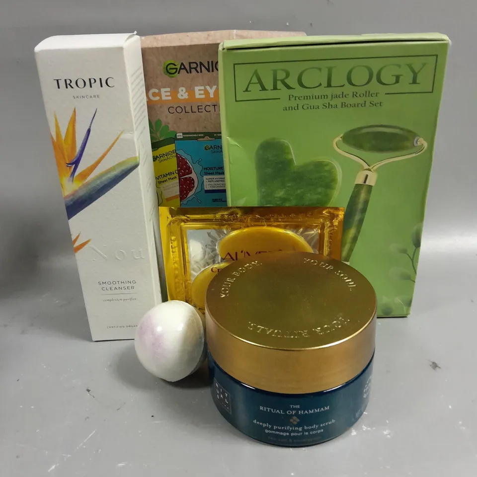 LOT OF 5 HEALTH AND BEAUTY PRODUCTS TO INCLUDE TROPIC SKINCARE SMOOTHING CLEANSER (120ML), RITUALS SEA SALT & EUCALYPTUS BODY SCRUB (300G), GARNIER FACE AND EYE TRIO FACE MASK COLLECTION, ECT.