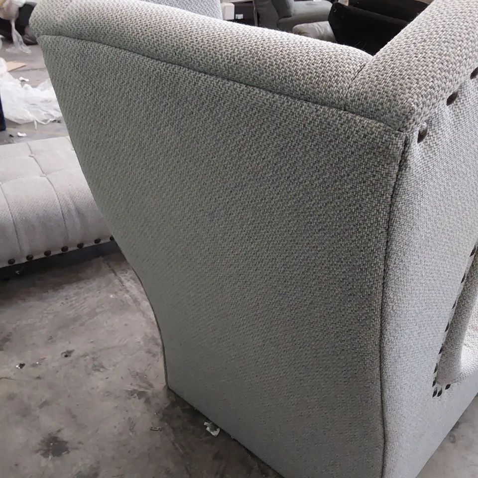 DESIGNER HIGH BACKED WINGED EASY CHAIR GREY FABRIC WITH STUDDED DETAIL 