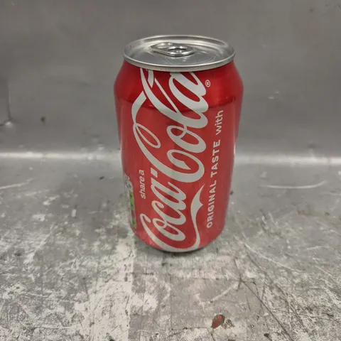 APPROXIMATELY 15 COCA-COLA CANS 