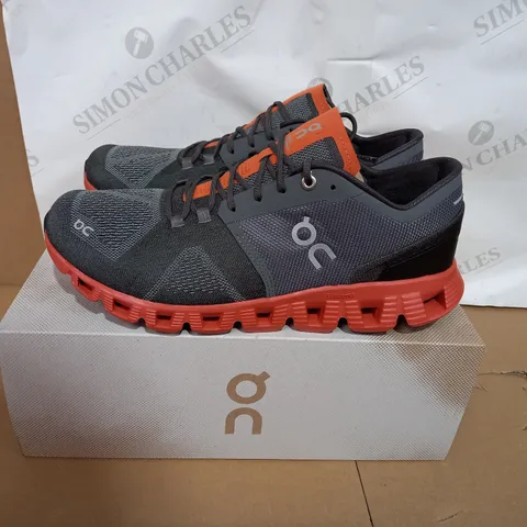 BOXED PAIR OF ON CLOUD X RUST TRAINERS SIZE 9