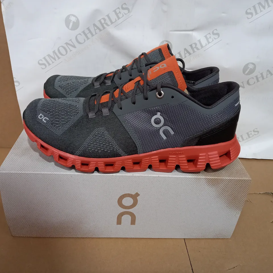 BOXED PAIR OF ON CLOUD X RUST TRAINERS SIZE 9