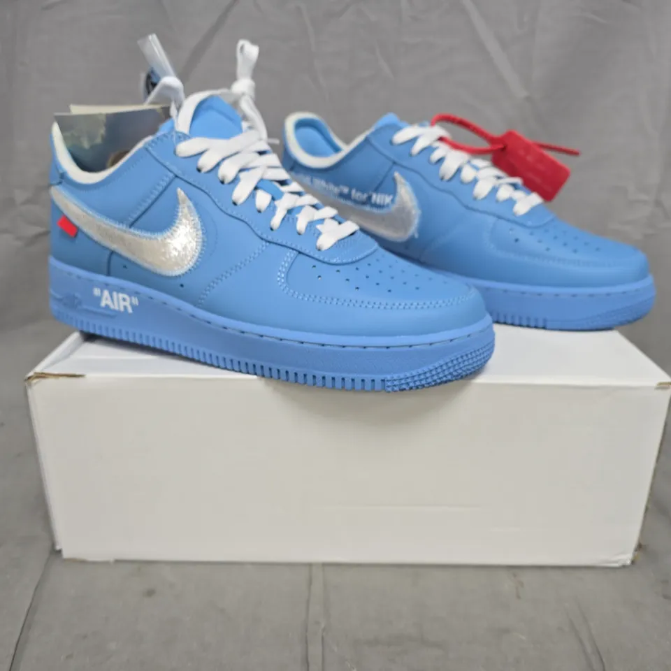 BOXED PAIR OF NIKE AIR FORCE 1 '07 OFF WHITE SHOES IN BLUE/SILVER SIZE UK 8