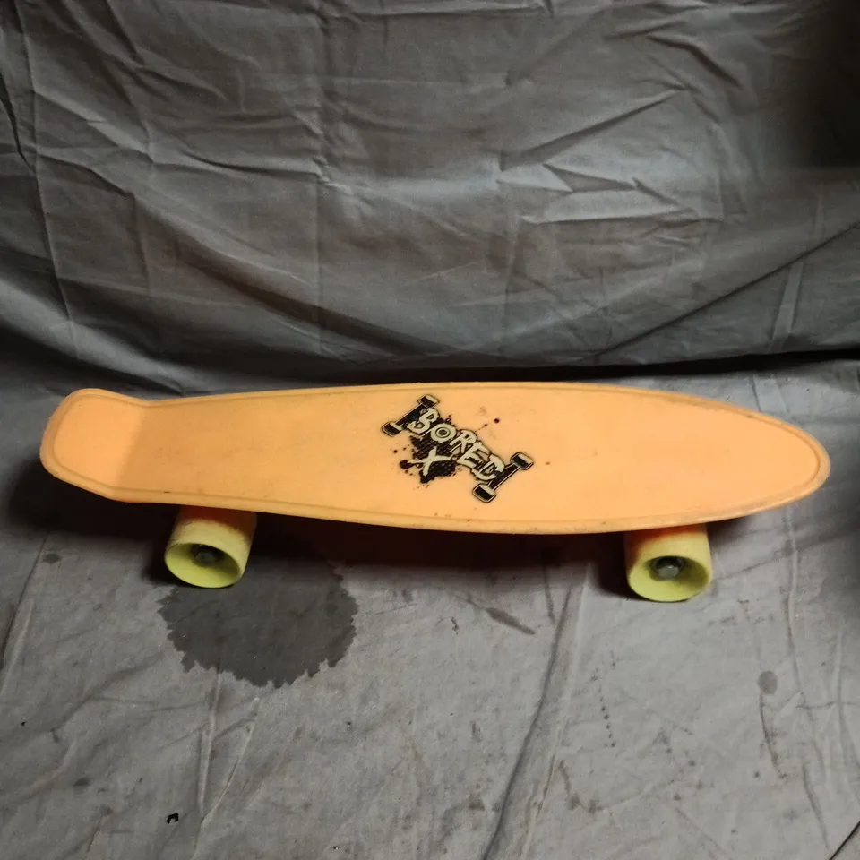 BORED X PLASTIC CRUISER SKATEBOARD – PEACH DECK, LIME WHEELS