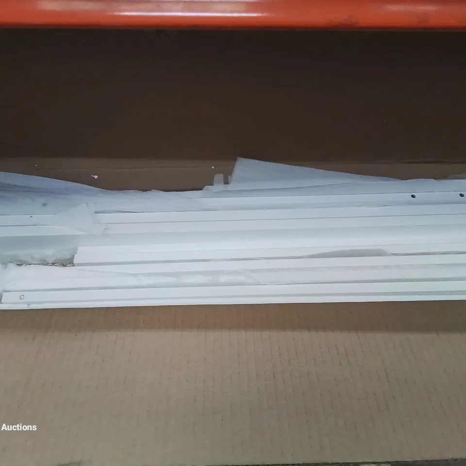 A BOXED WHITE RADIATOR COVER