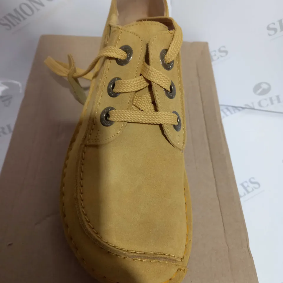 BOXED PAIR OF CLARKS FUNNY DREAM YELLOW SUEDE IN SIZE 6 