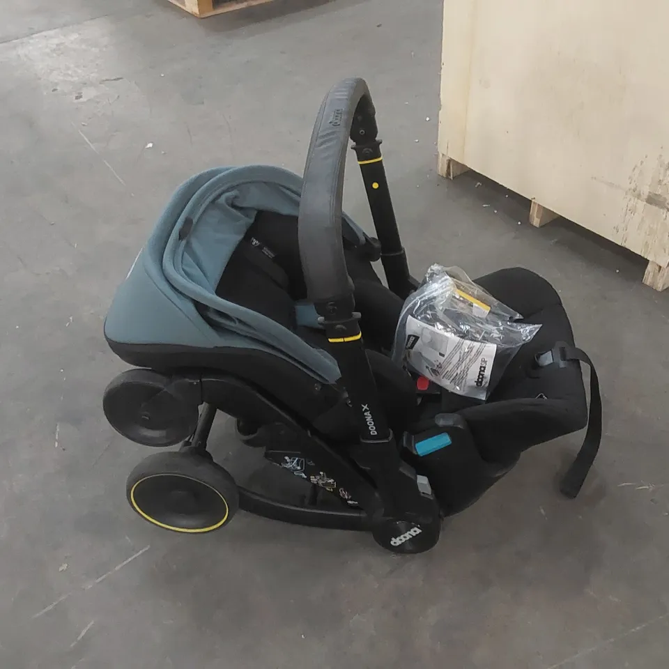 DOONA DOONAX INFANT CAR SEAT - OCEAN BLUE RRP £549.99