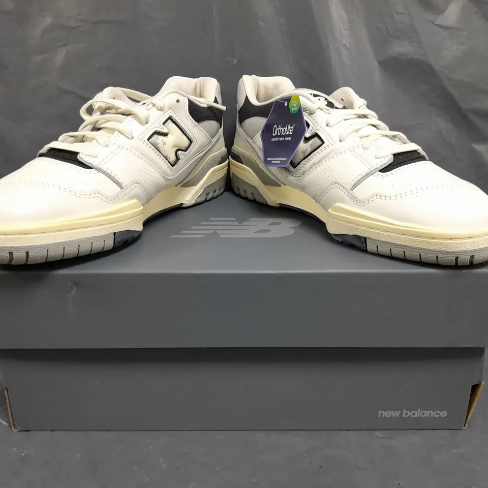 BOXED PAIR OF NEW BALANCE 550 TRAINERS IN WHITE/BLACK SIZE UK 7.5