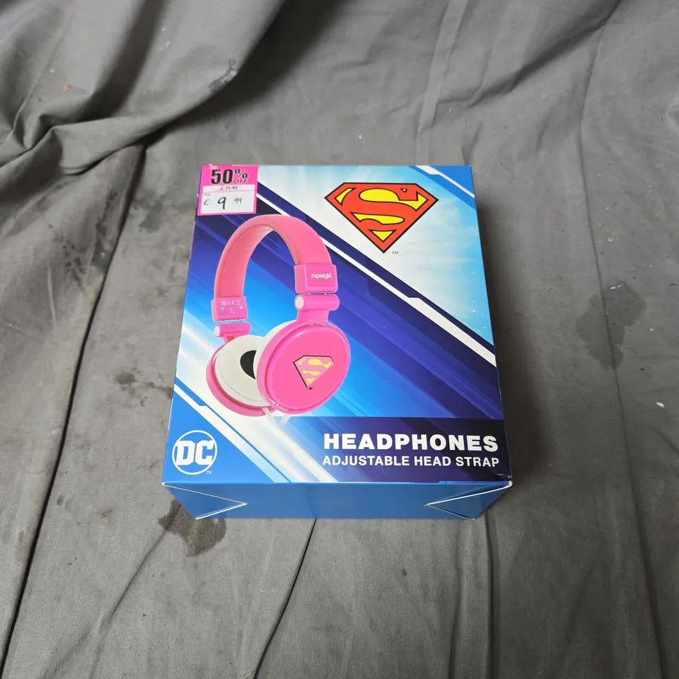 APPROXIMATELY 6 BOXED DC SUPERMAN HEADPHONES WITH ADJUSTABLE HEAD STRAP 