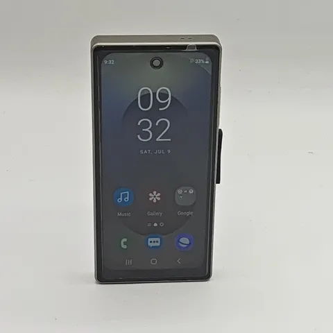 UNBOXED MINI GENERIC ANDROID MOBILE PHONE IN PURPLE 