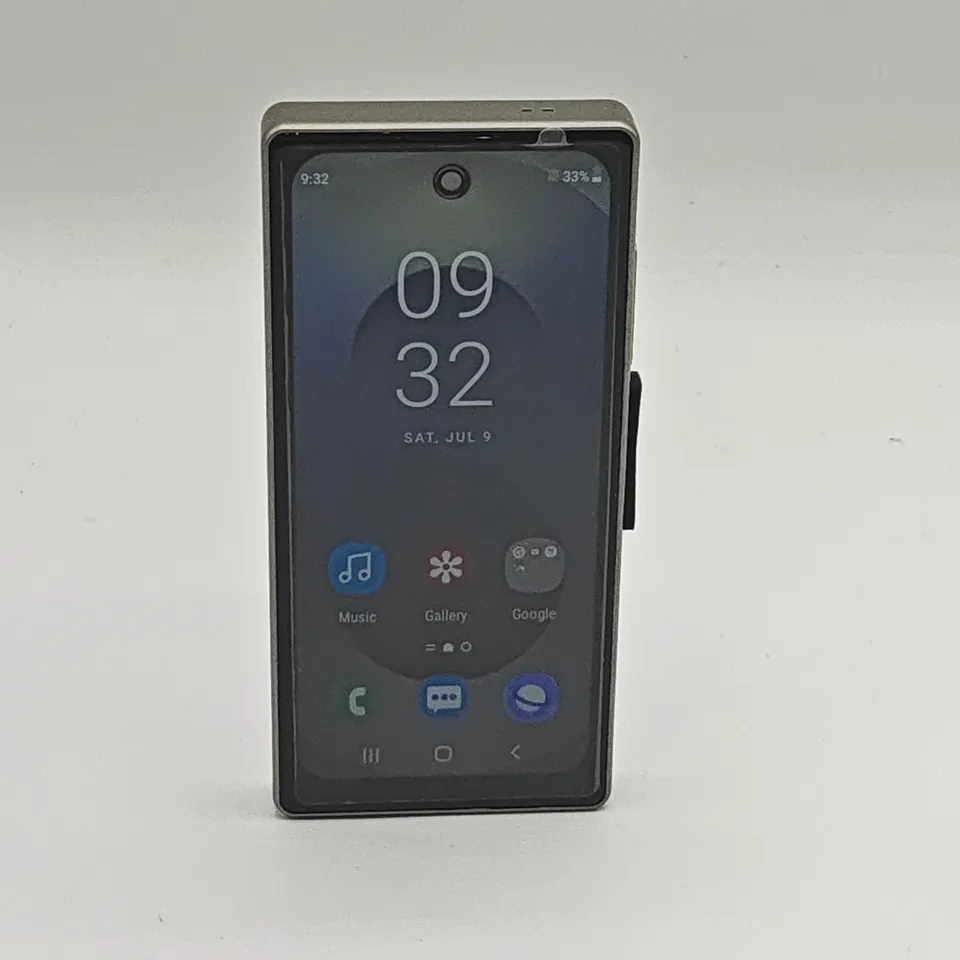 UNBOXED MINI GENERIC ANDROID MOBILE PHONE IN PURPLE 