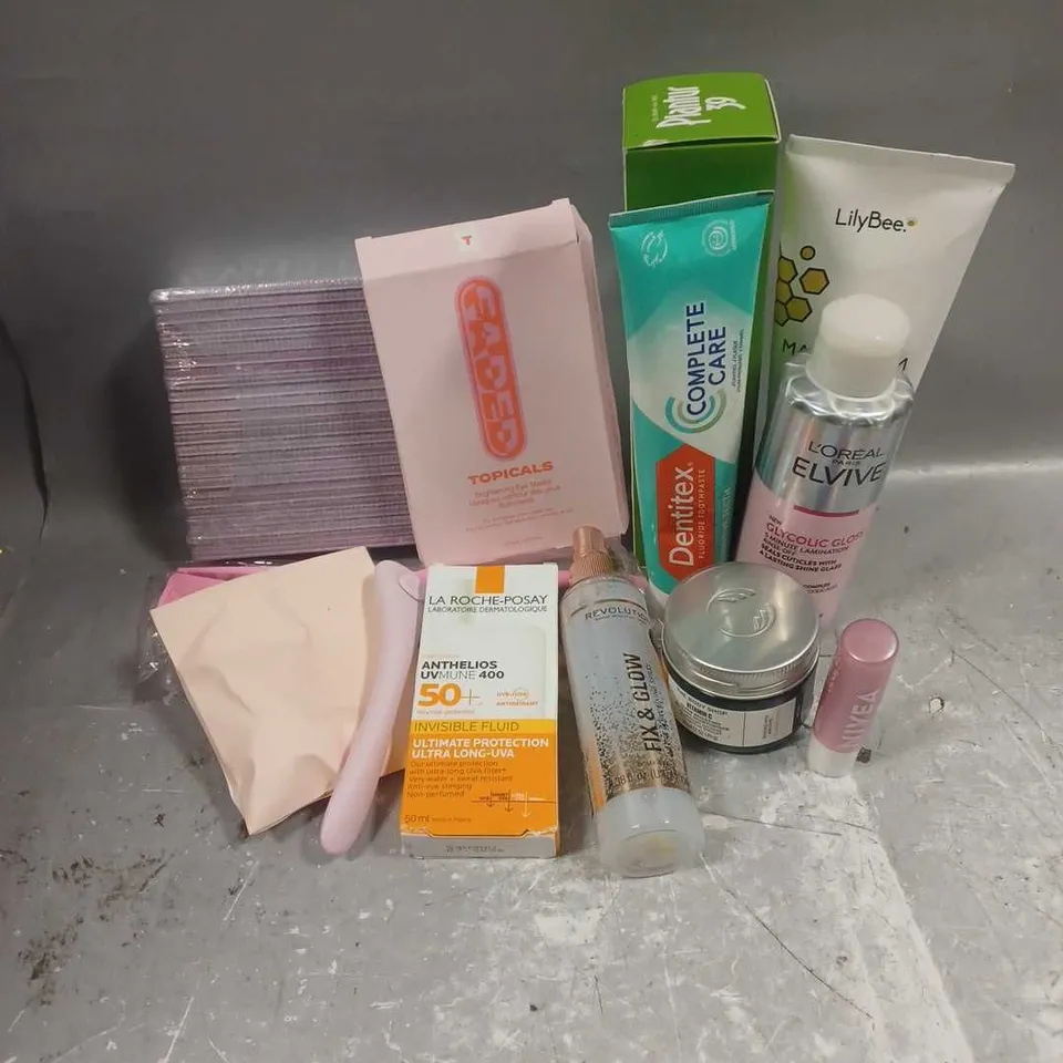 APPROXIMATELY 20 ASSORTED COSMETIC PRODUCTS INCLUDE - L'OREAL ELVIVE 5 MINUTE LAMINATION - ESTRID RAZOR - TOPICALS BRIGHTENING EYE MASKS - ETC