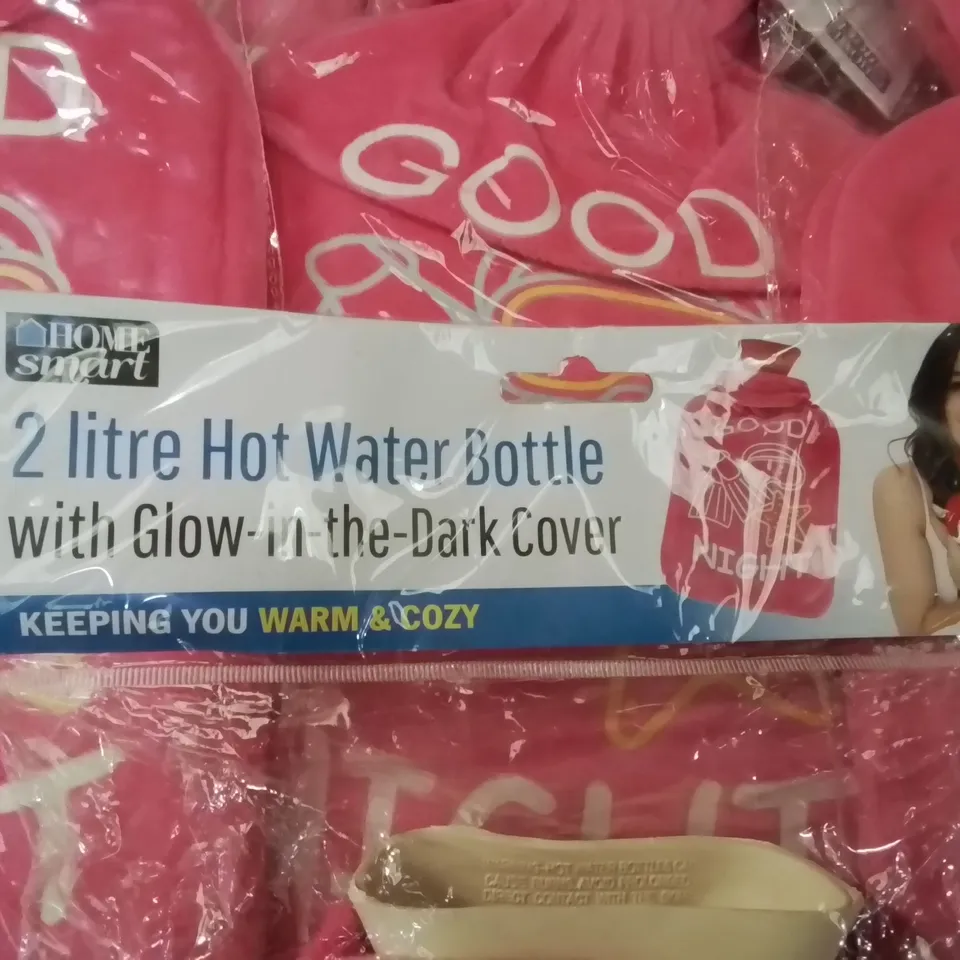 BOX CONTAINING APPROXIMATELY 20 BAGGED AND SEALED 2 LITRE HOT WATER BOTTLES WITH GLOW IN THE DARK COVER
