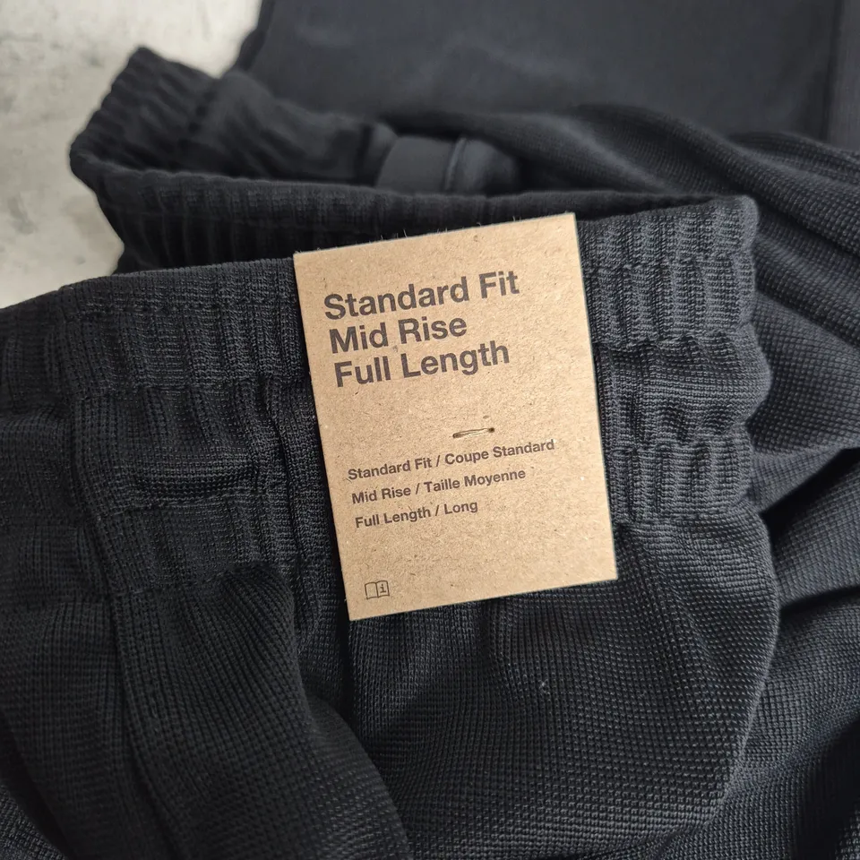 NIKE JORDAN SIDE STRIPE TRACKSUIT BOTTOMS IN BLACK