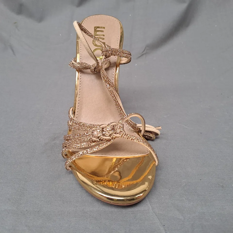 BOXED PAIR OF EGO OPEN TOE STILETTO HEEL STRAPPY SANDALS IN METALLIC GOLD UK SIZE 6
