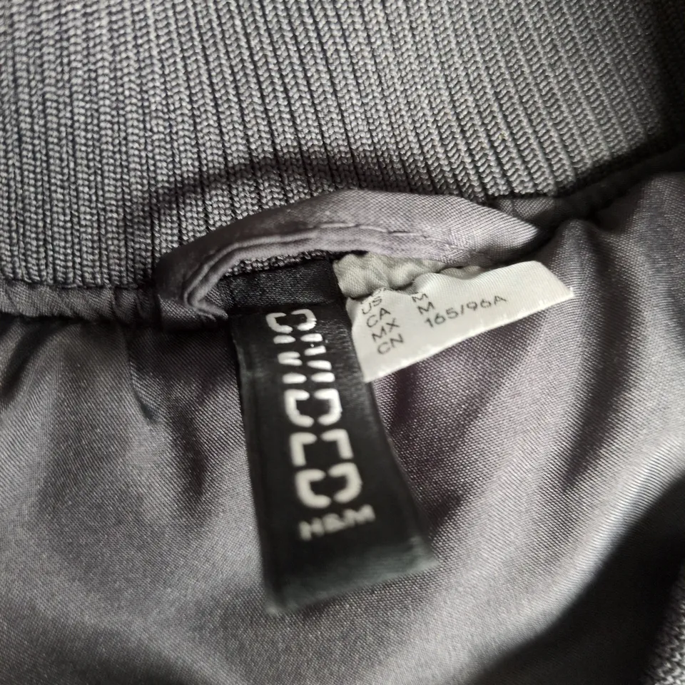 RACING BOMBER JACKET – BLACK WITH PINK TRIM, 'RACING THRILL SEEKER' MOTIF (US M, CN 165/96A)