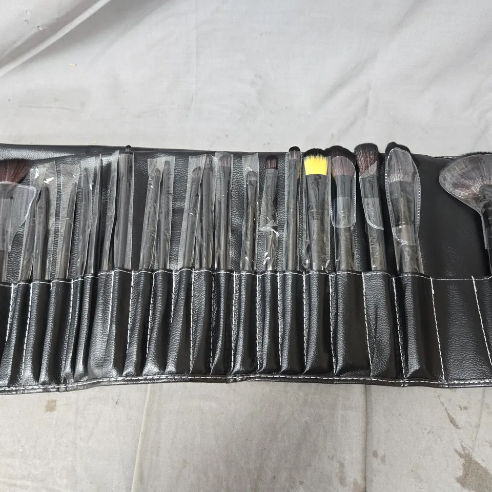 APPROXIMATELY 25 24-PIECE MAKEUP BRUSH SETS IN ROLL – BLACK FAUX-LEATHER CASE
