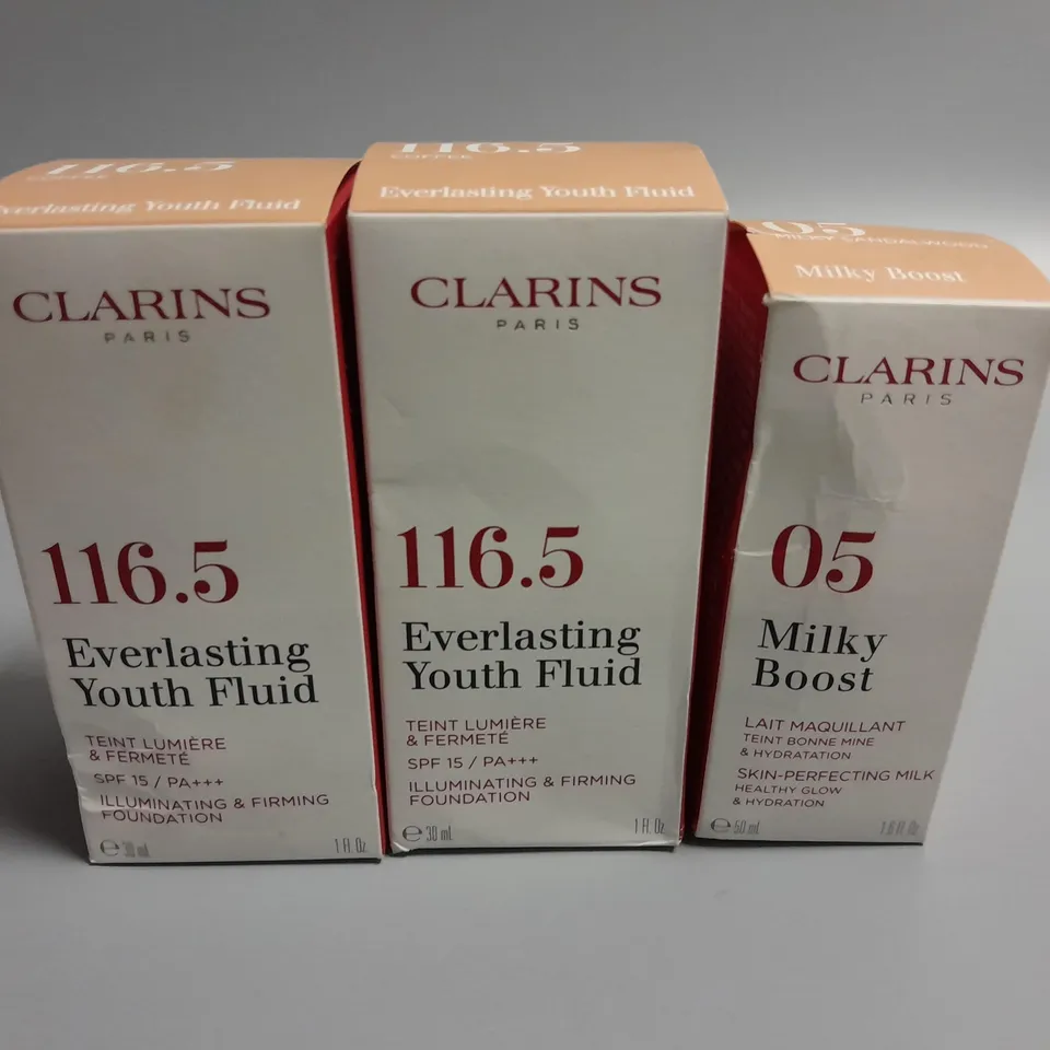 LOT OF 3 CLARINS BEAUTY ITEMS INCLUDES 2 116.5 COFFEE FOUNDATIONS AND MILKY BOOST 