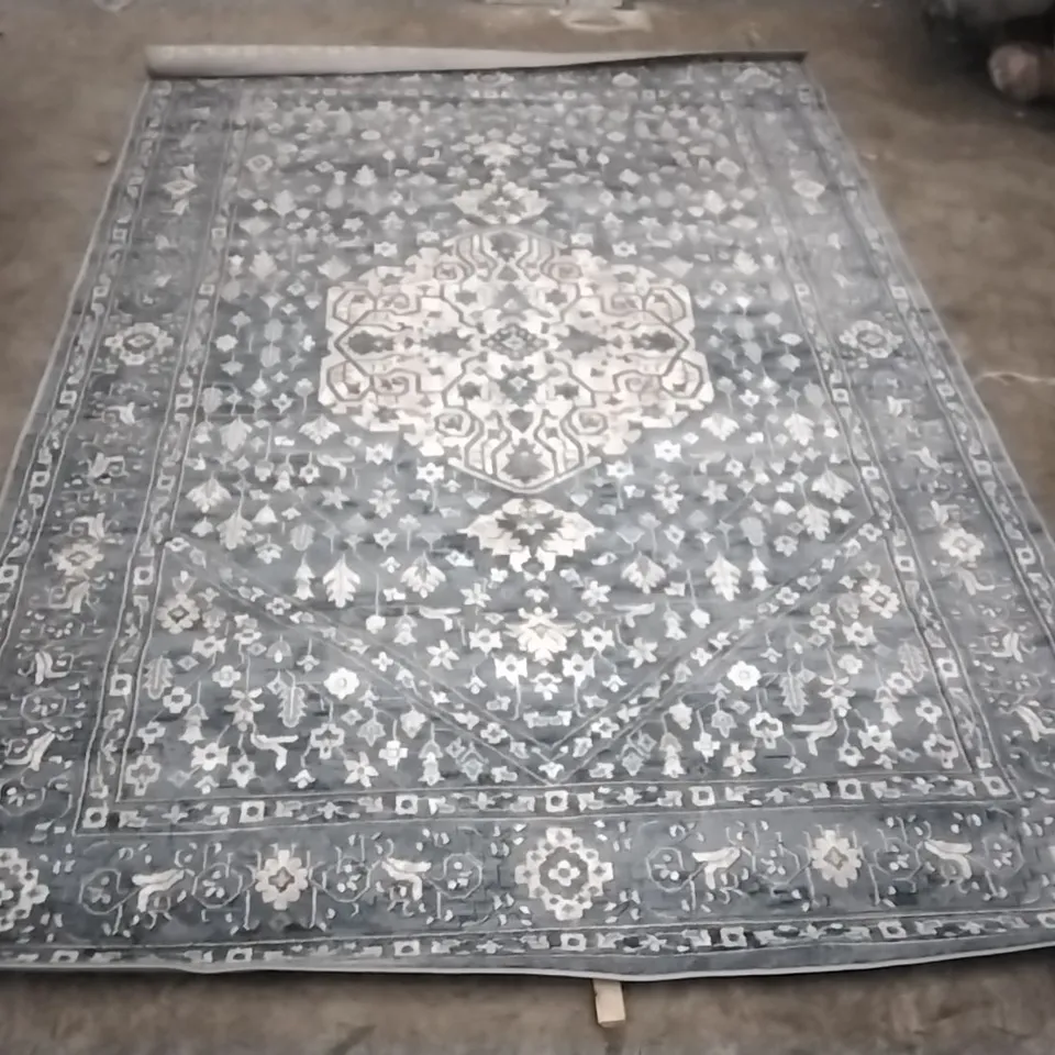 STILLAGE OF APPROXIMATELY 22 DESIGNER RUGS