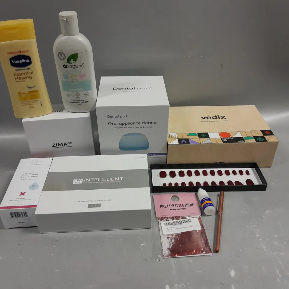 BOX OF APPROXIMATELY 10 COSMETIC ITEMS TO INCLUDE ORAL APPLIANCE CLEANER, BABY WASH , TEETH WHITENING KIT, ETC