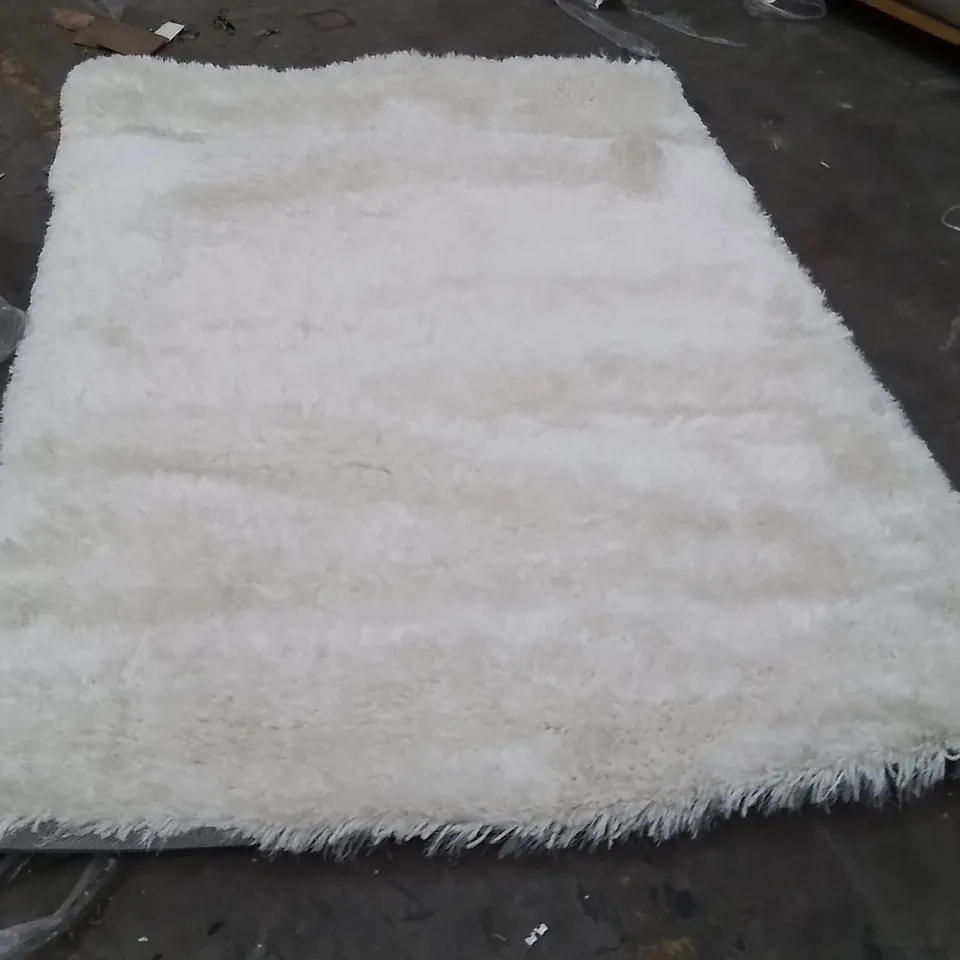 STILLAGE OF APPROXIMATELY 20 QUALITY DESIGNER RUGS