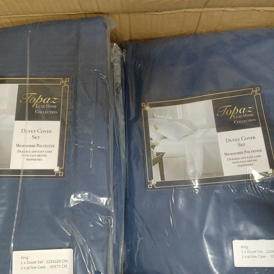 BOX OF APPROXIMATELY 10 TOPAZ HOME DUVET COVER SETS IN BLUE