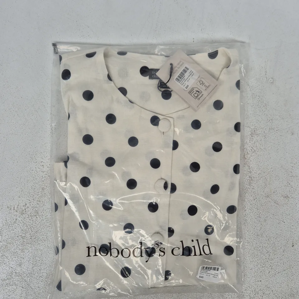 BAGGED NOBODY'S CHILD RONNE FRILL BUTTON THROUGH TOP IN CREAM W. BLACK SPOTS SIZE UK 12