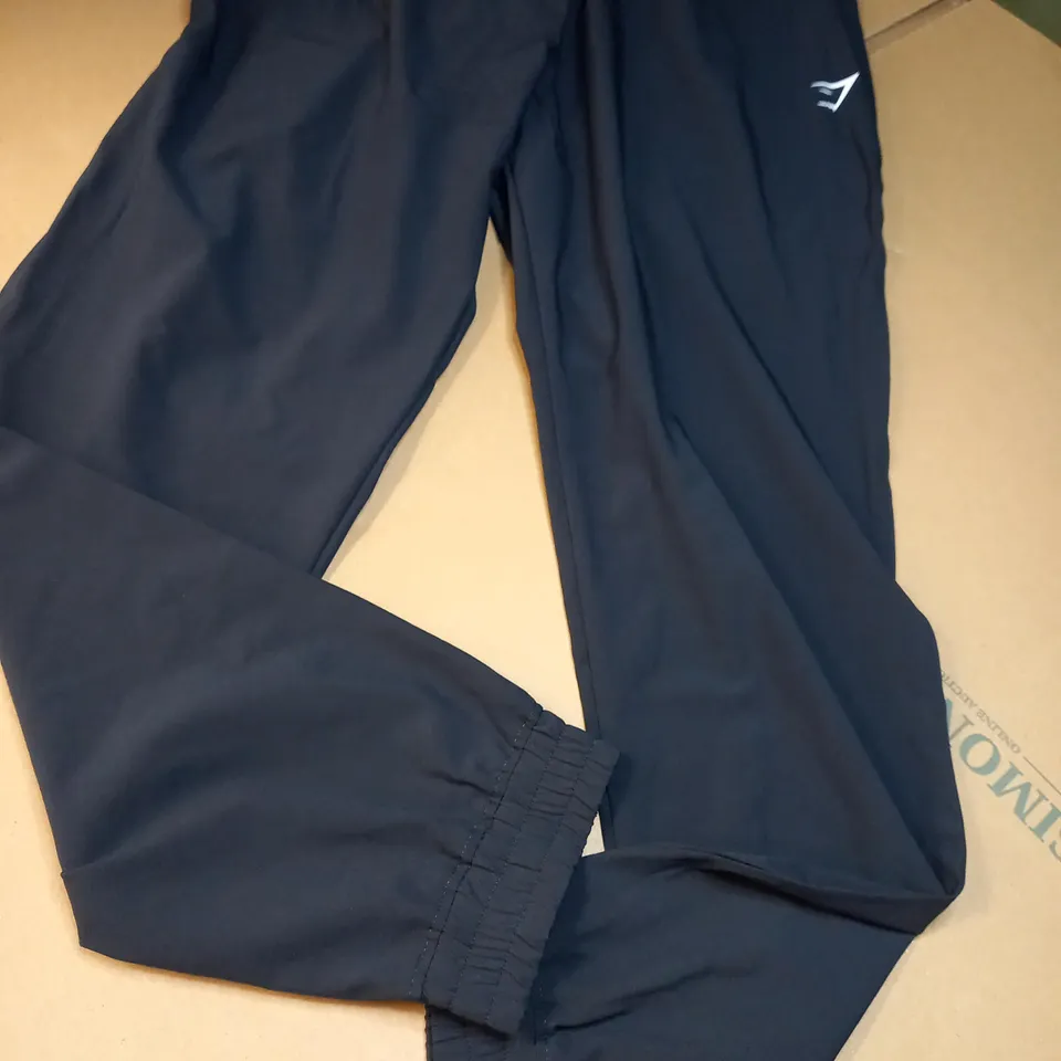 GYMSHARK BLACK/LOGO LIGHT WEIGHT TRACK BOTTOMS - MEDIUM