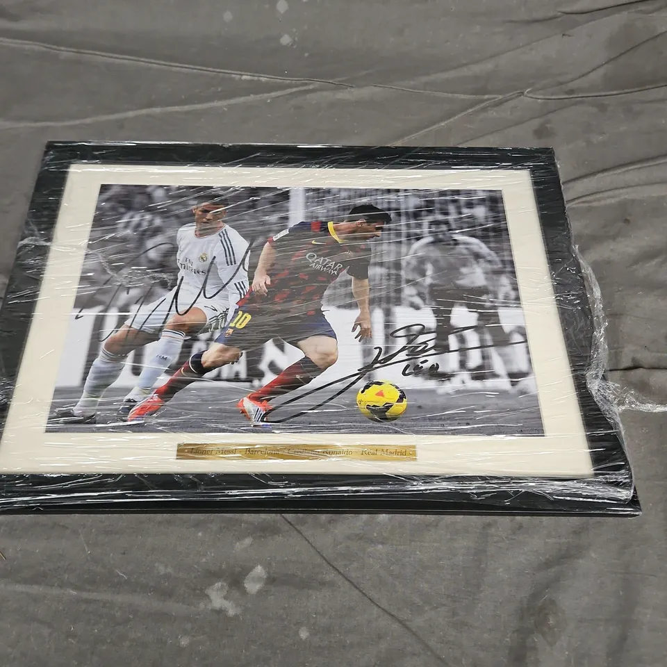 LIONEL MESSI/CRISTIANO RONALDO FRAMED PRINT - COLLECTION ONLY
