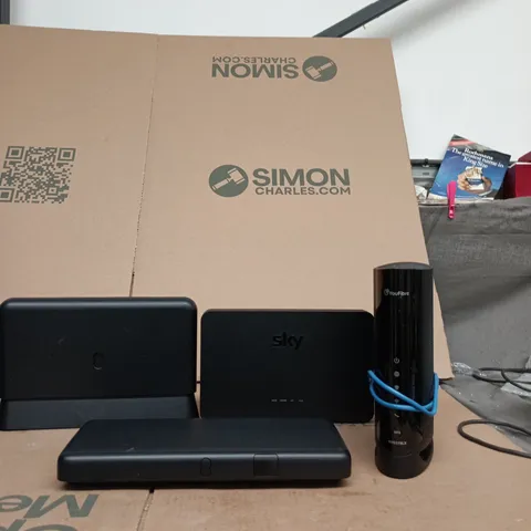 TOTE OF APPROXIMATELY 4 WIFI ROUTERS AND CABLES