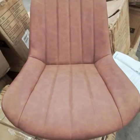 A BOXED PAIR OF BROWN FAUX LEATHER UPHOLSTERED DINING CHAIRS