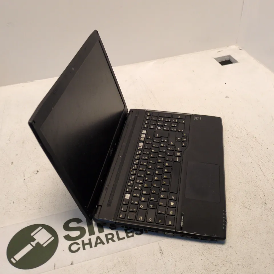 FUJITSU LIFEBOOK A544 LAPTOP – BLACK, UNTESTED, FAULTY (MISSING KEYCAPS)