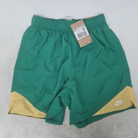 NIKE WINDRUNNER LIGHTWEIGHT WOVEN SHORTS IN GREEN/YELLOW SIZE XS