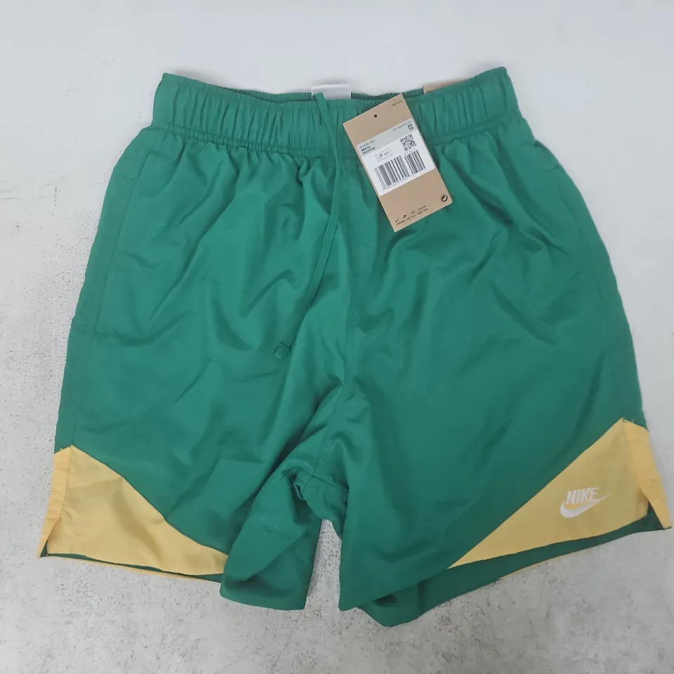 NIKE WINDRUNNER LIGHTWEIGHT WOVEN SHORTS IN GREEN/YELLOW SIZE XS