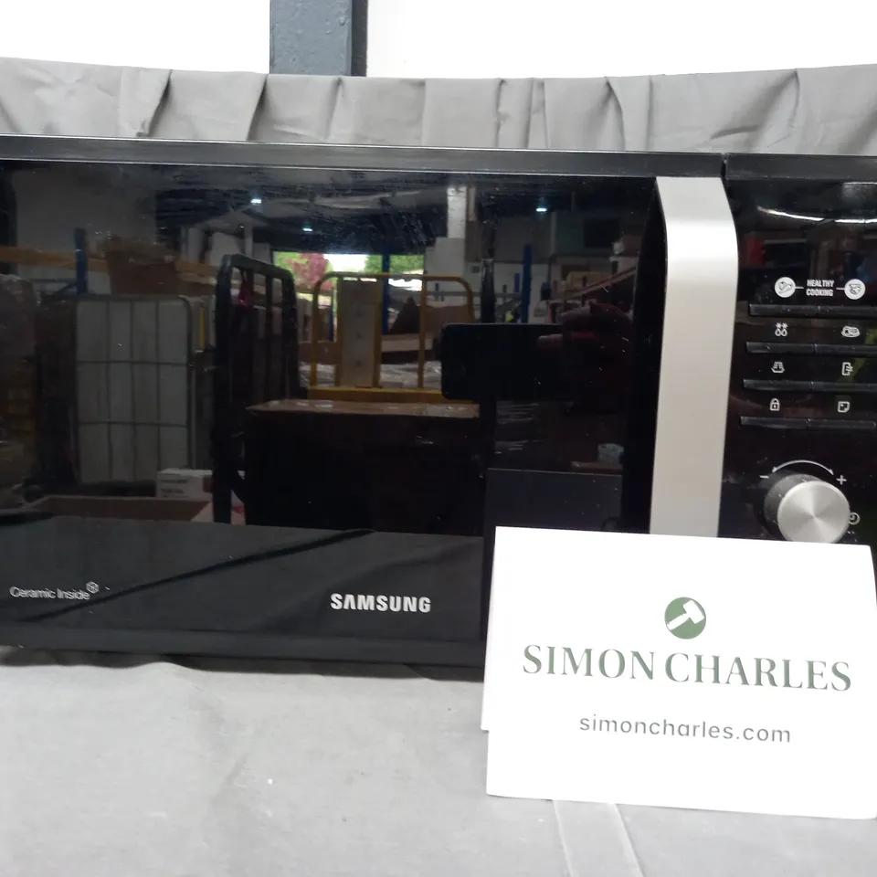BOXED SAMSUNG MS23F301TFK/EU 23 LITRE SOLO MICROWAVE - BLACK RRP £129.99