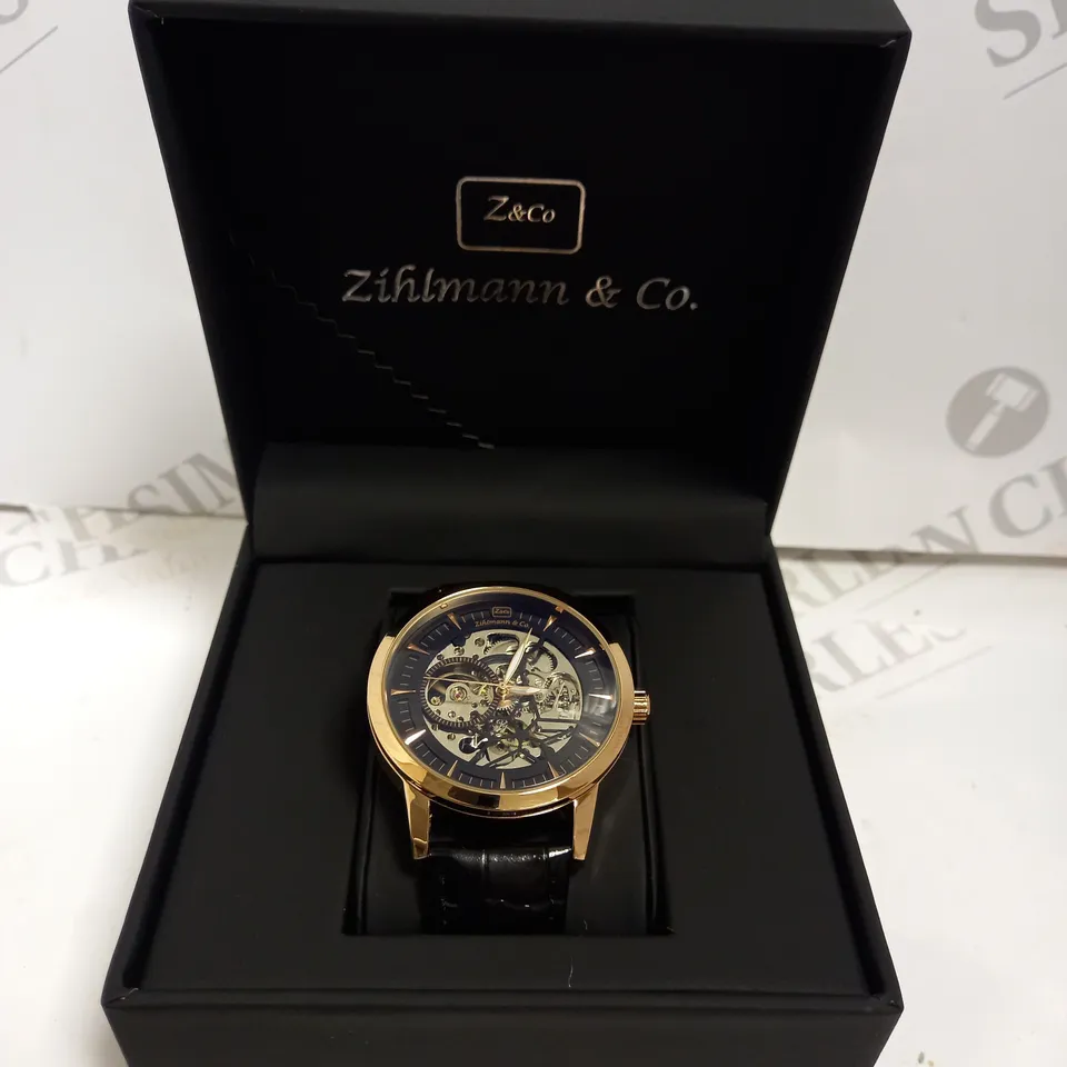 MENS ZIHLMANN & CO AUTOMATIC WATCH - Z210 – SKELETON DIAL – GOLD COLOUR CASE – GENUINE LEATHER CASE – HAND ASSEMBLED. 