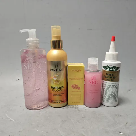 APPROXIMATELY 12 ASSORTED HEALTH & BEAUTY ITEMS TO INCLUDE - SUNKISS GLOW , WILD GROWTH HAIR OIL , SBC BODY WASH ETC