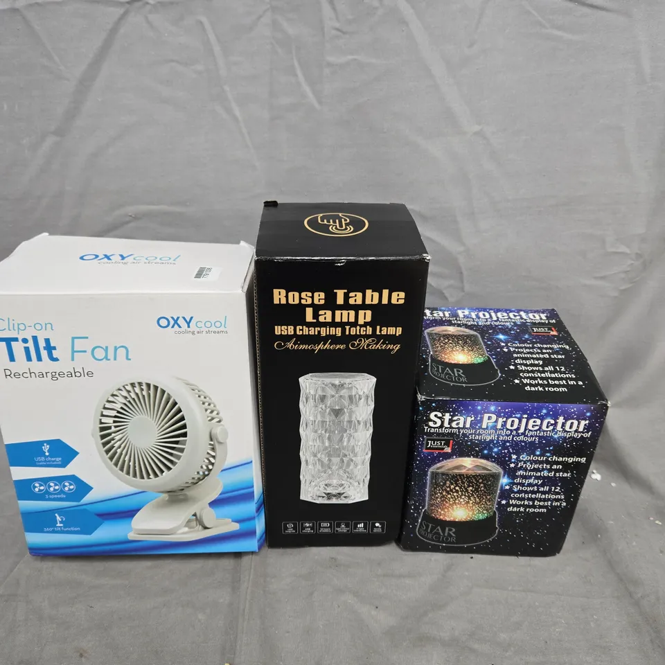 APPROXIMATELY 10 ASSORTED HOUSEHOLD PRODUCTS TO INCLUDE STAR PROJECTOR, TABLE LAMP, CLIP ON FAN ETC 