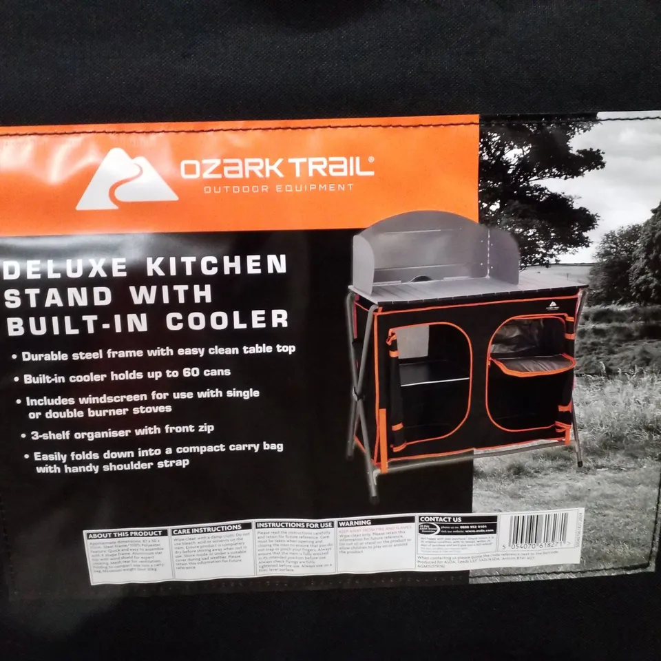 BOXED OZARK TRAIL DELUXE KITCHEN STAND WITH BUILT-IN COOLER