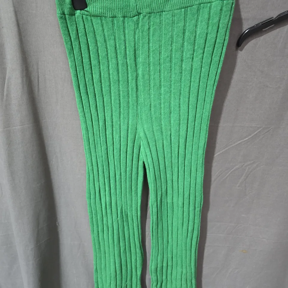 BOX OF APPROXIMATELY 25 CLOTHING ITEMS INCLUDING: ASOS BAG, GREEN PANTS AND BOOHOO TOP