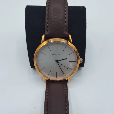 BOXED PAUL SMITH STAINLESS STEEL WATCH WITH JAPANESE MOVEMENT AND BROWN LEATHER STRAP