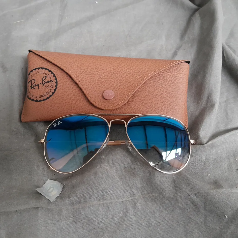 ray ban sunglasses in gold and blue 