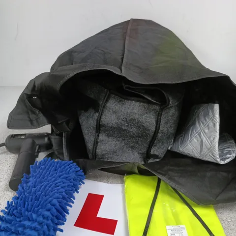 APPROXIMATELY 7 ASSORTED CAR PRODUCTS TO INCLUDE L PLATES, TIRE INFLATOR, CAR COVER ETC
