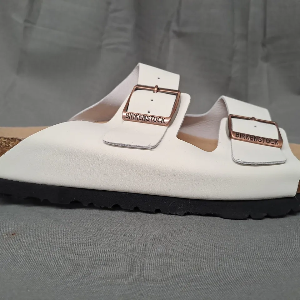 PAIR OF BIRKENSTOCK OPEN TOE SANDALS IN WHITE EU SIZE 41