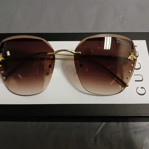 BOXED PAIR OF GUCCI GLASSES